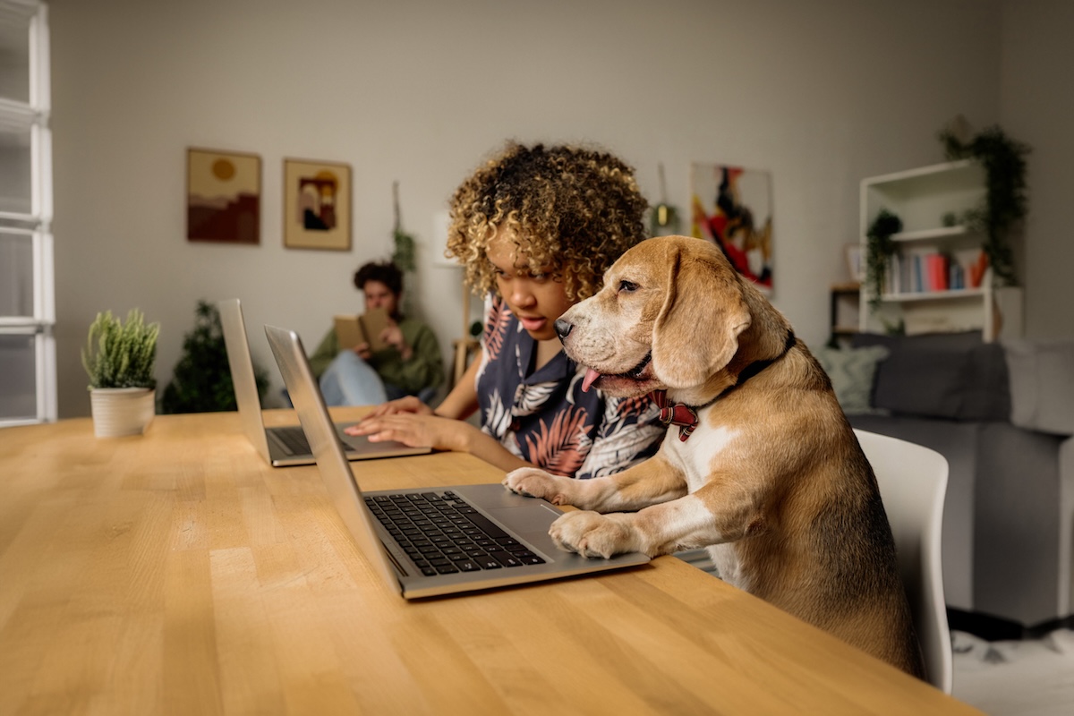 woman with dog at work